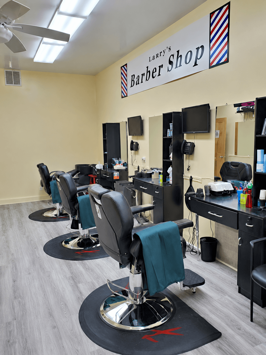 Interior of Larry's Barber Shop — classic barber chairs in Wilmette